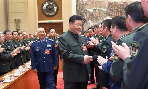 习近平出席解放军和武警部队代表团全体会议